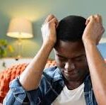 stressed african man